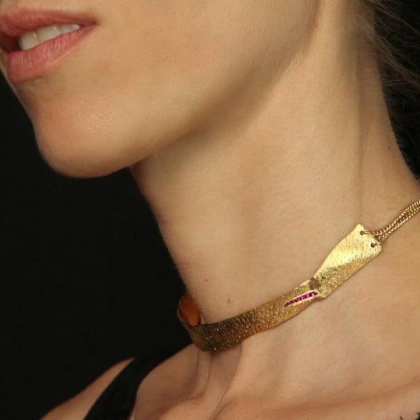 Skin-textured choker. gold plated sterling silver with rubies.