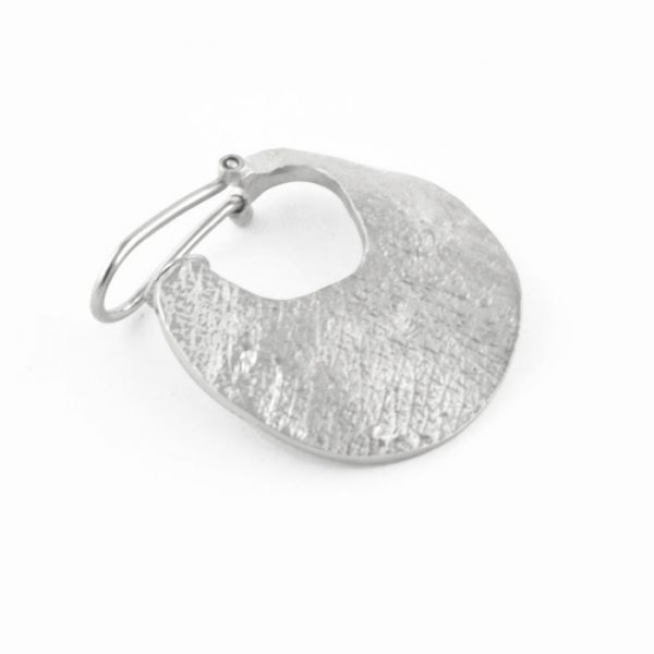 skin-textured clip earring.